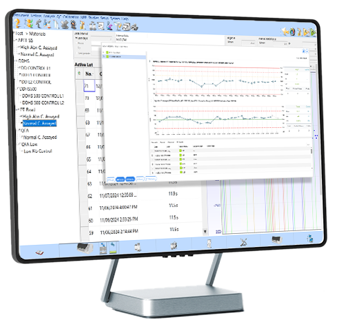 Photo shows a monitor with a sample lot-to-lot conversion report through HemoHub Intelligent Data Manager. Light blue rings are seen behind the monitor giving an artistic quality to it.